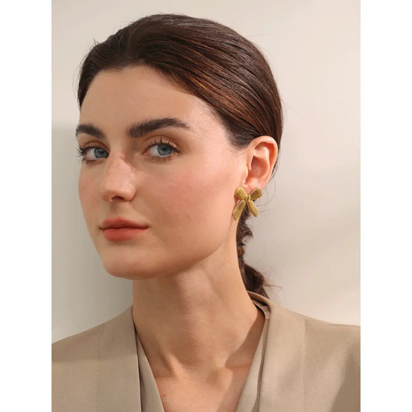 Anti tarnish golden bow earrings