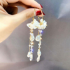 white flower teassel long ear ring