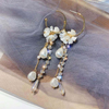 white flower teassel long ear ring