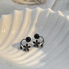 Black flower pearl earrings
