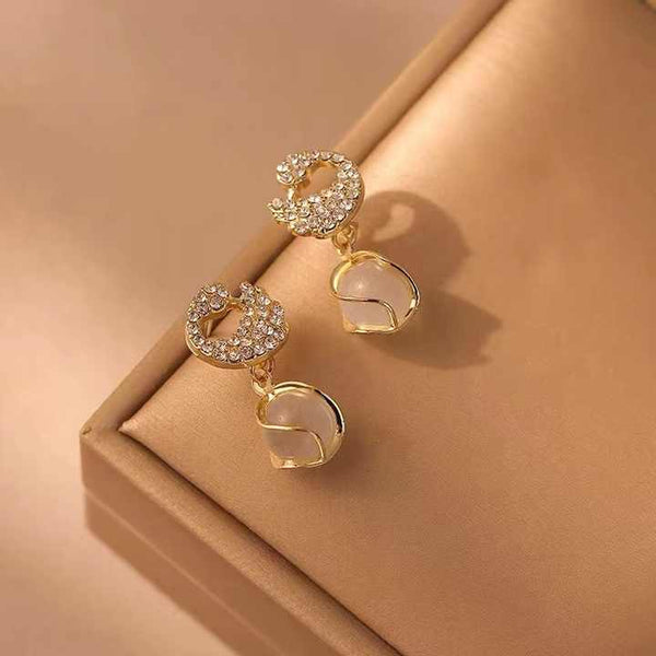 Glorious Pearl Peacock and white Moti Earring