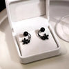 Black flower pearl earrings