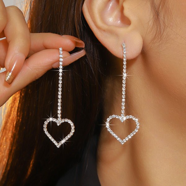 Heart shaped diamond dangle earrings