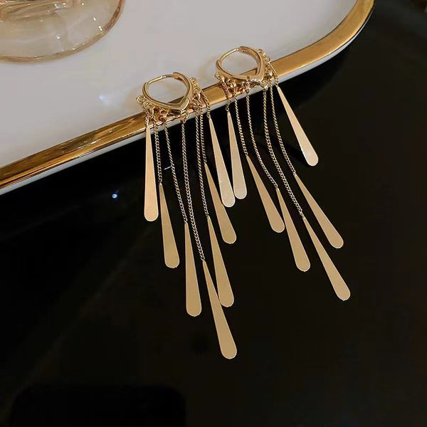 Golden long tassel earrings