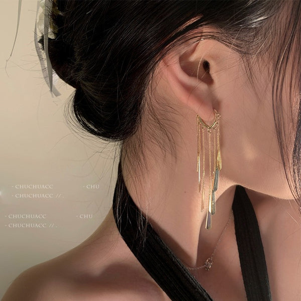 Golden long tassel earrings