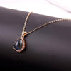 Gold-Toned Necklace with Black Teardrop Pendant