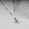 White Circular And Green Stone Necklace