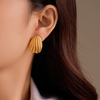 Anti tarnish gold waves stud earrings