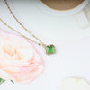 Green crystal with long chain necklace