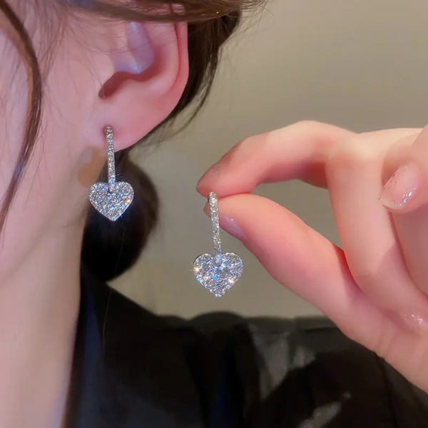 White stone heart drop earrings