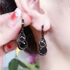 Breathtaking Black Bolls Hoop Earring