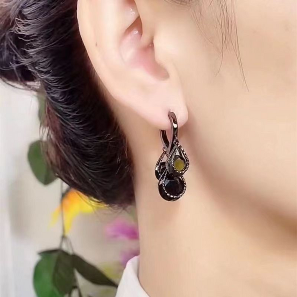 Breathtaking Black Bolls Hoop Earring