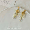 Yellow shade Pearl earrings