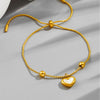 Gold Bracelet With White Heart Charm