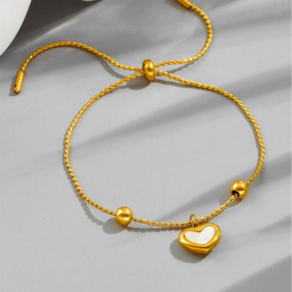 Gold Bracelet With White Heart Charm