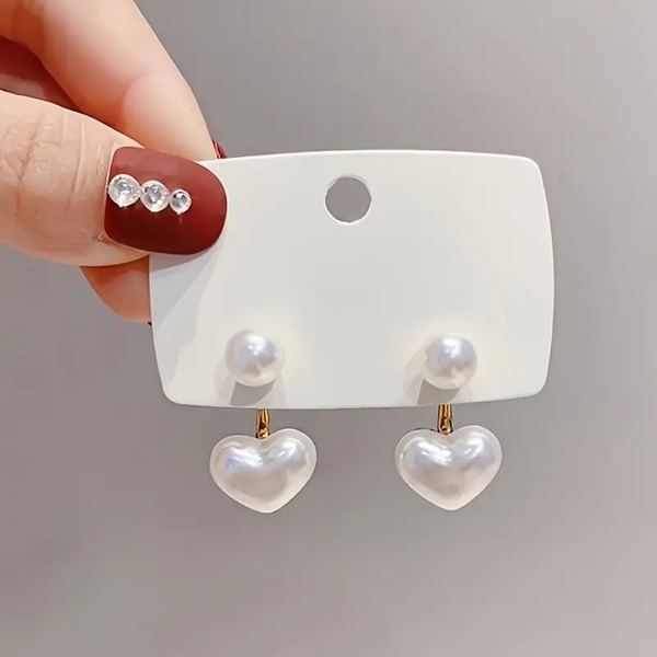 Heart-shaped pearl earrings