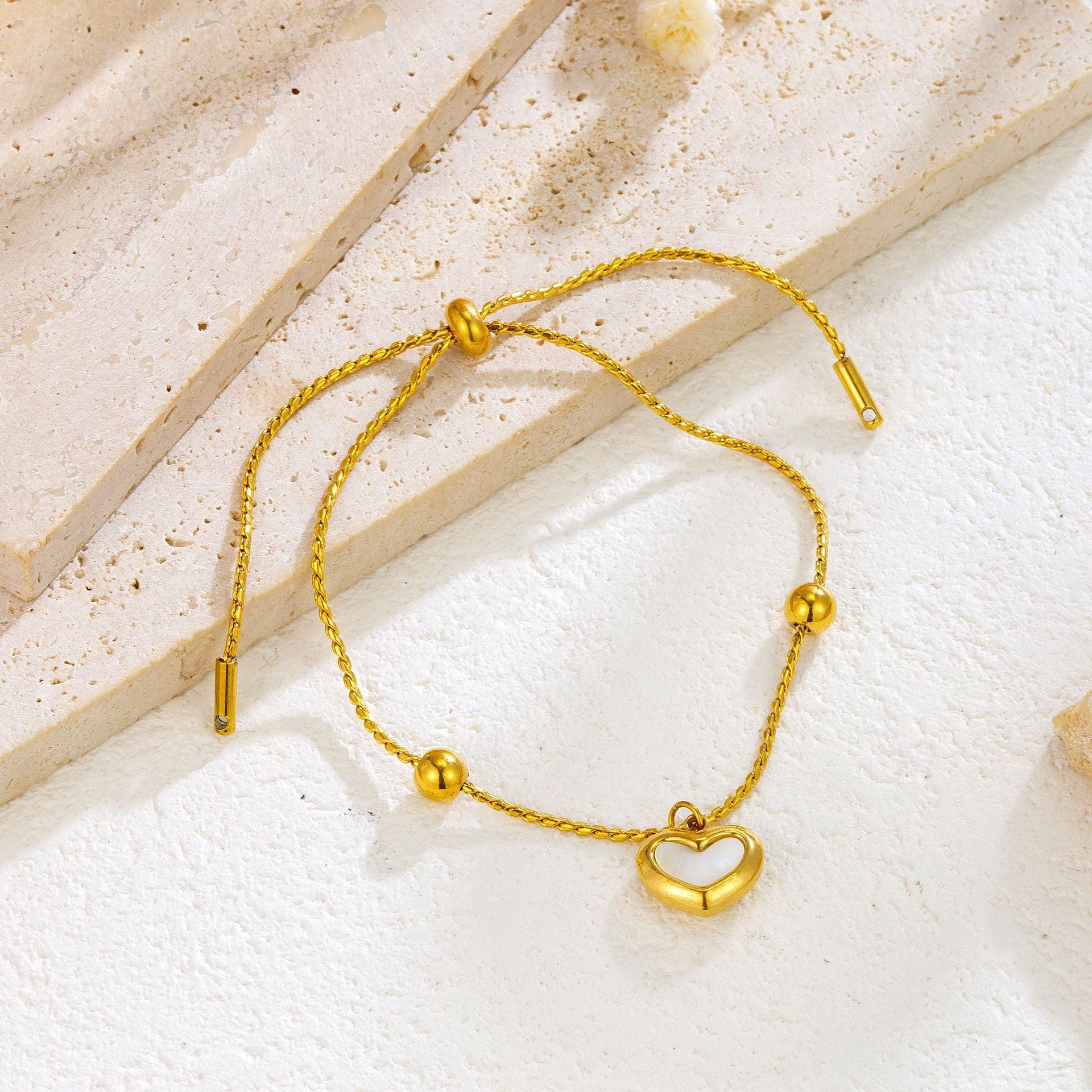 Gold Bracelet With White Heart Charm