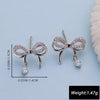 Rhinestone bow stud earrings