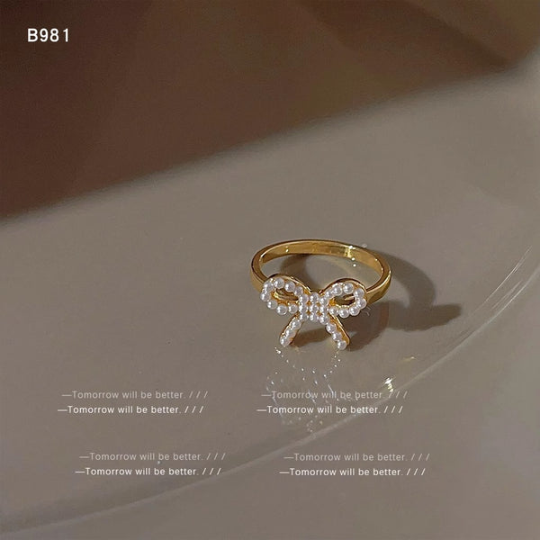 Gold Bow Ring With White Pearl