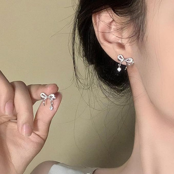 Rhinestone bow stud earrings