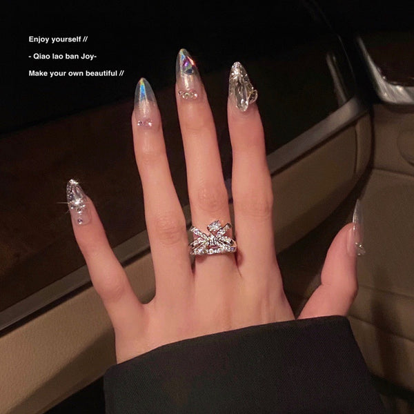 Bow-design ring with gemstones