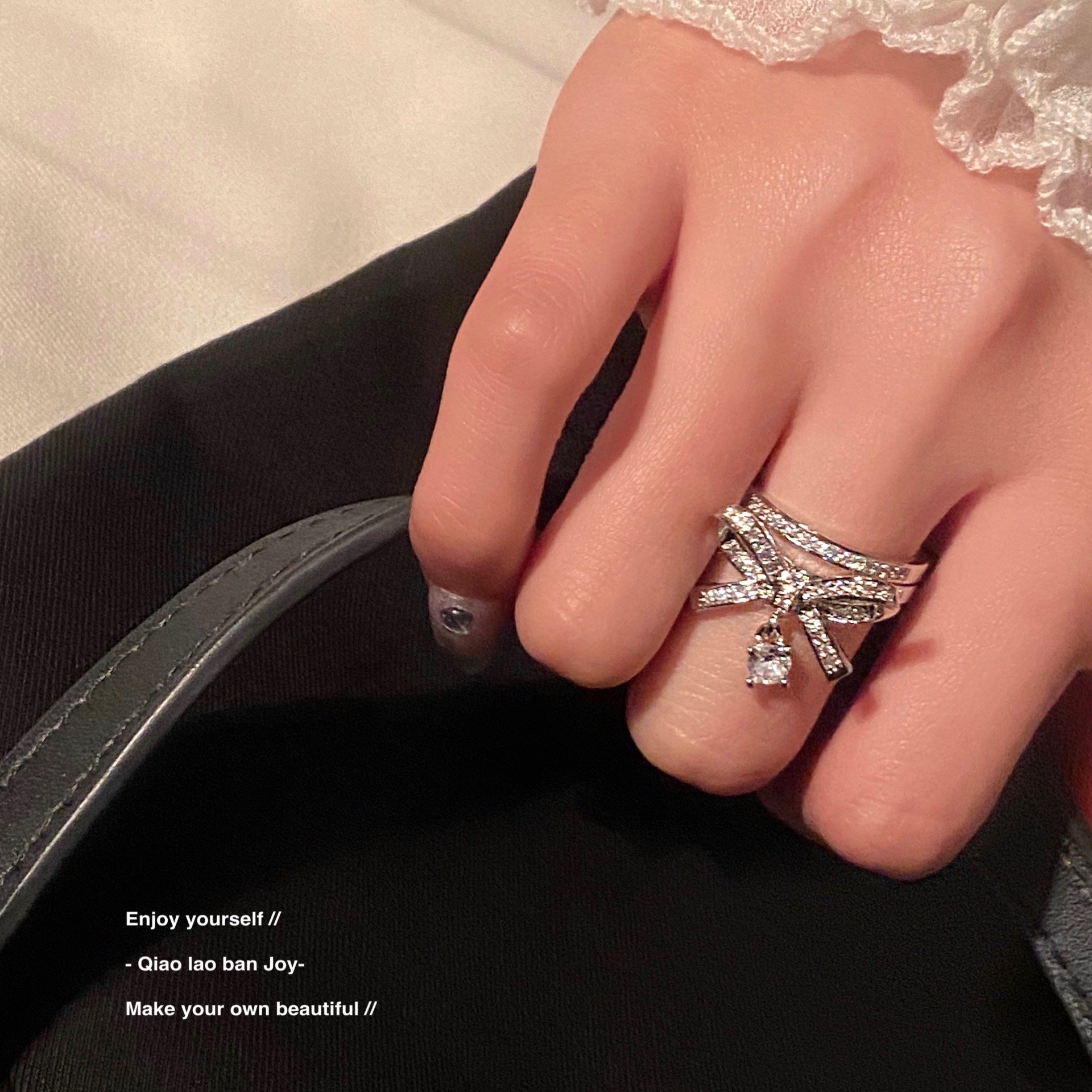 Bow-design ring with gemstones