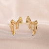 Gold Bow Pearl Design Stud Earrings