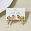 Gold Bow Pearl Design Stud Earrings
