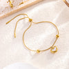 Gold Bracelet With White Heart Charm
