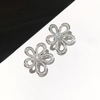 Silver flower stud earring
