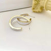 White hoop earrings