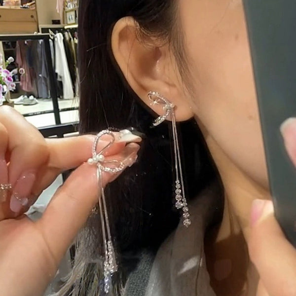 White bow long tassel earrings