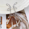 White bow long tassel earrings