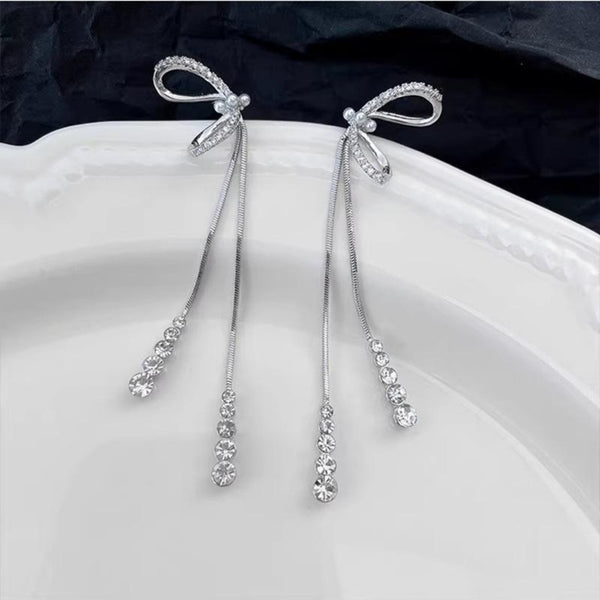 White bow long tassel earrings