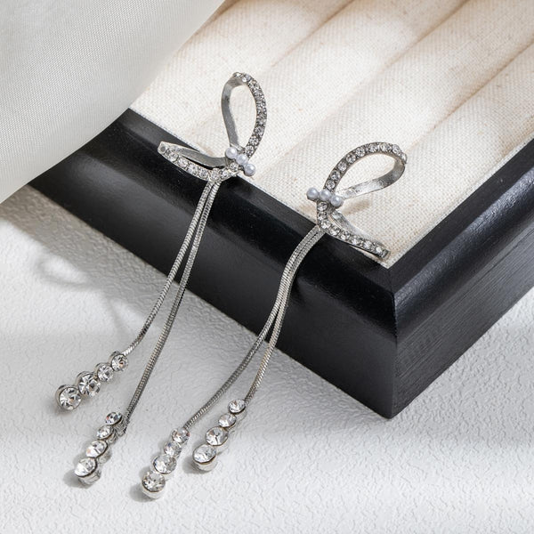 White bow long tassel earrings