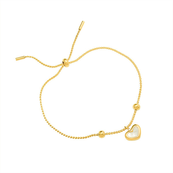 Gold Bracelet With White Heart Charm