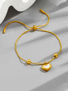 Gold Bracelet With White Heart Charm
