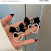 Delightful Black Bow Heart Earring