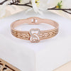 Rose Gold Plated Bracelet with Interlocking Heart Design and Crystal Accents".