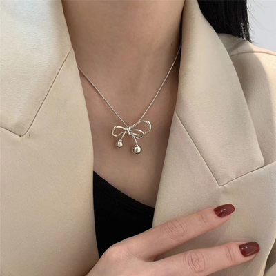 Silver Bow Necklace