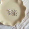 Pack Of 2 Black Star & White Butterfly Earring
