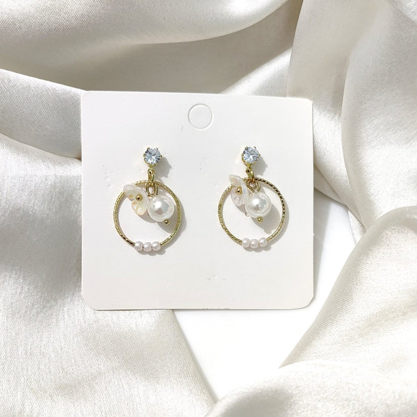 Charming white pearl earring