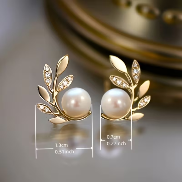 Gold plated and pearl leaf earring