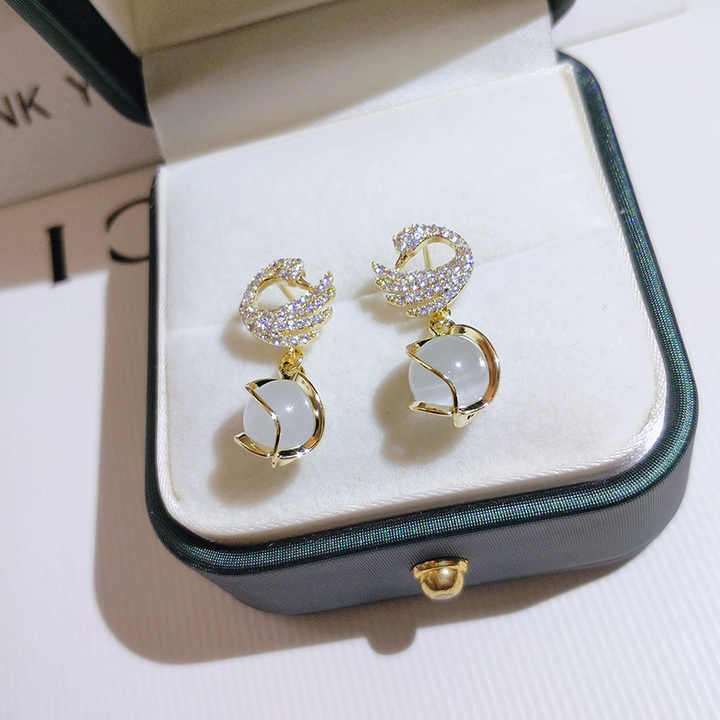 Glorious Pearl Peacock and white Moti Earring