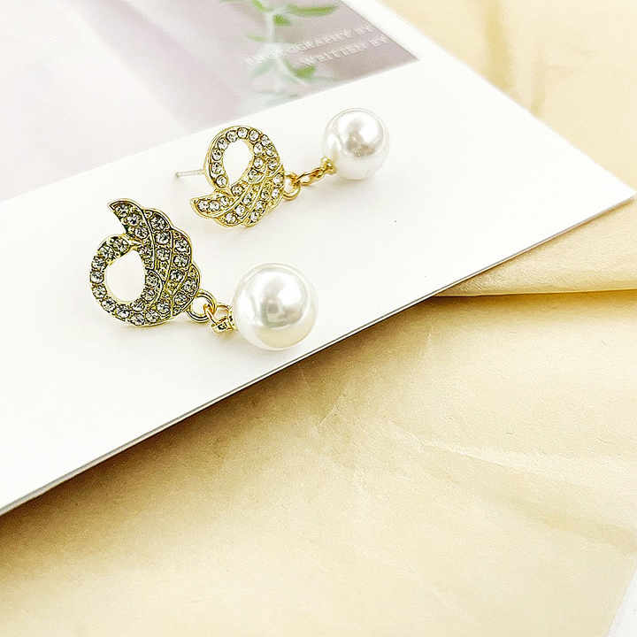 Glorious Pearl Peacock and white Moti Earring