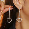 Heart shaped diamond dangle earrings