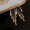 Golden long tassel earrings