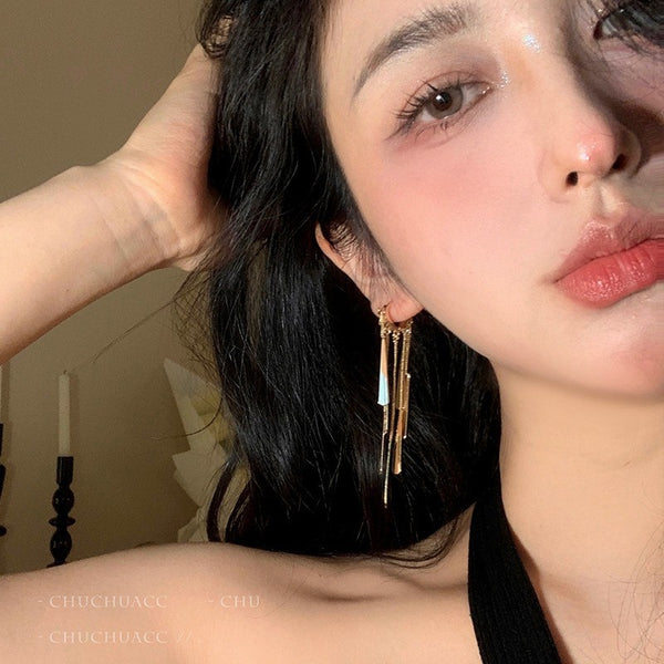 Golden long tassel earrings