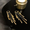 Golden long tassel earrings