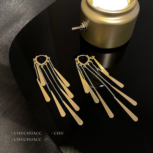 Golden long tassel earrings